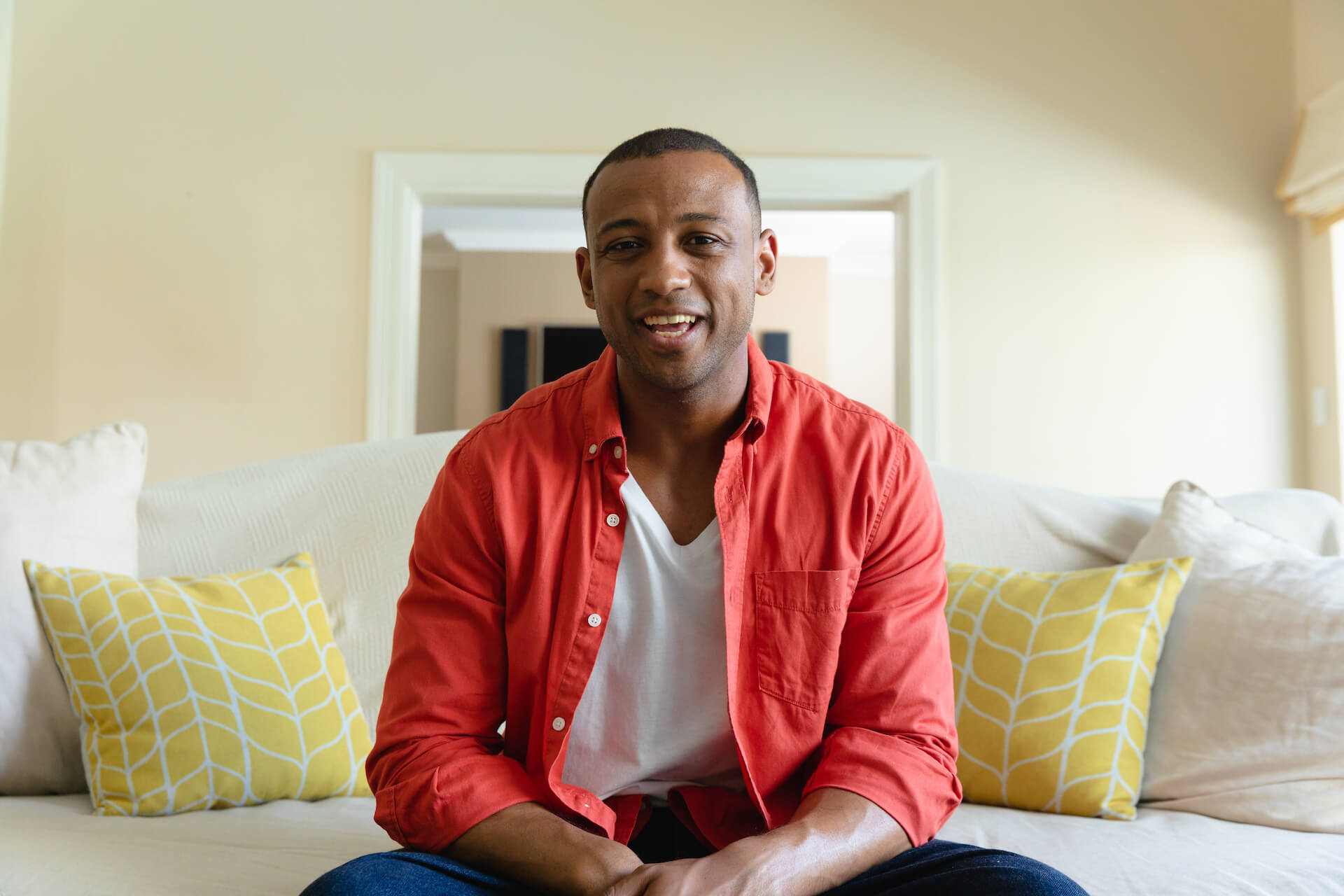 portrait-of-smiling-african-american-young-man-sit-2022-01-31-18-21-44-utc.jpg
