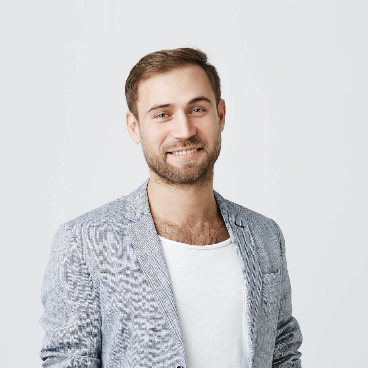 smiling-attractive-handsome-guy-with-beard-in-tren-2022-02-08-03-48-21-utc-e1653983777887.jpg