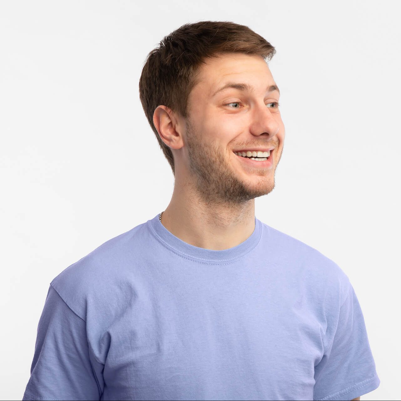 smiling-confident-man-looking-at-copy-space-on-whi-2022-02-08-04-15-05-utc-e1653983546136.jpg